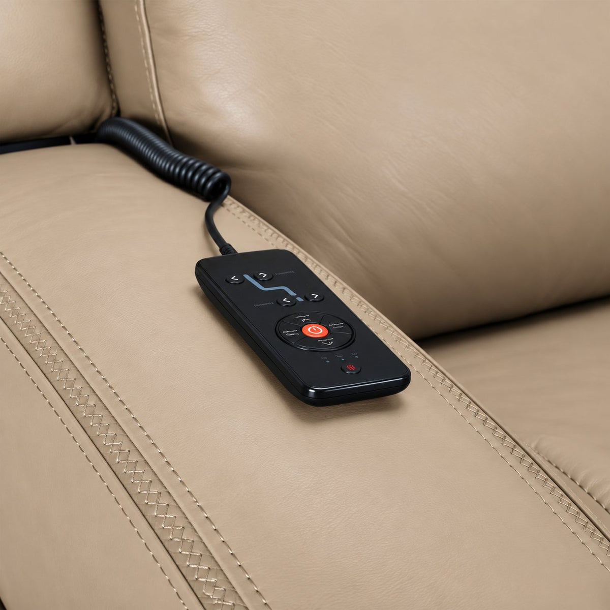 Jackson pristine leather seating close-up showing wired remote for power recline, heat and massage controls