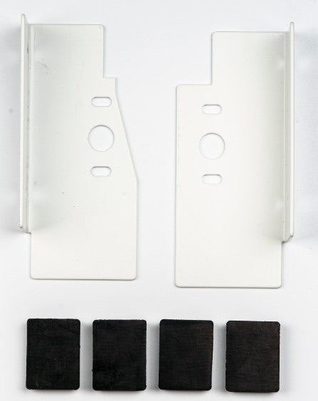 Two white stacking brackets and four black protective pads for compatible Midea laundry units
