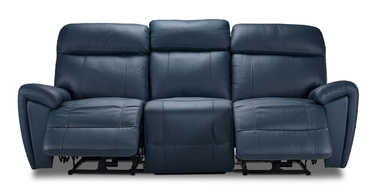 Apollo navy leather reclining sofa front view with both end footrests extended and adjustable headrests