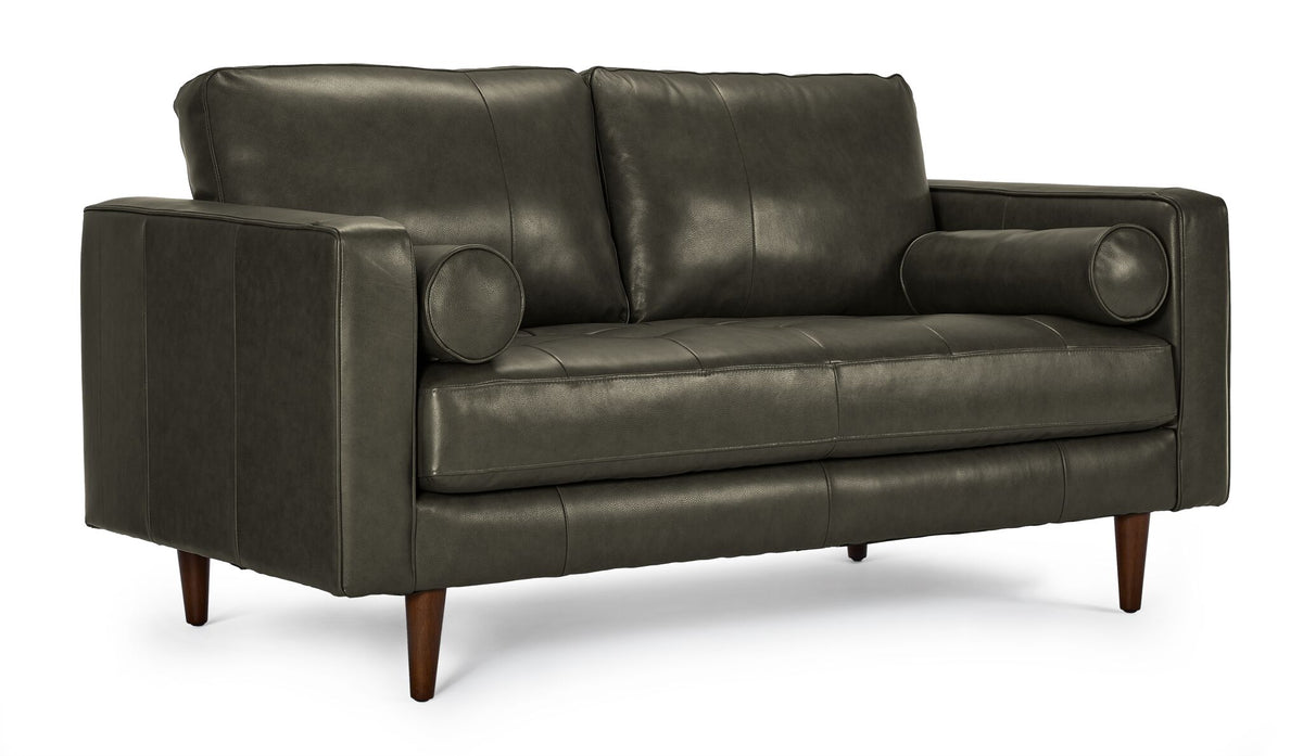Bari Leather Loveseat in charcoal shown from a three-quarter angle with tufted seat, two back cushions, bolster pillows and tapered wood legs