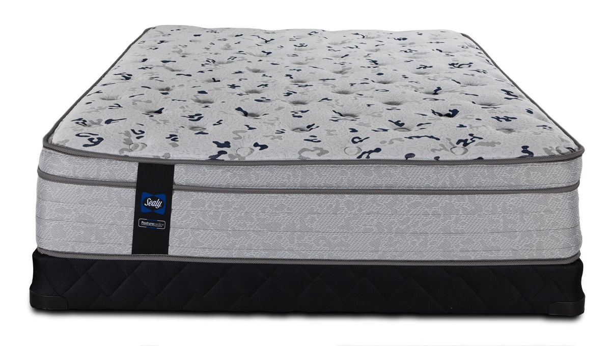 Front view of the Queen mattress and low-profile boxspring with patterned sides and Sealy branding