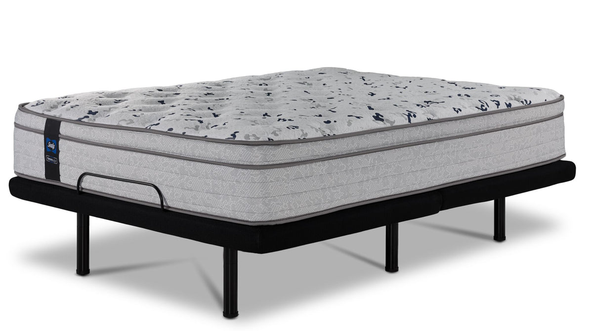King Euro top mattress on the black L2 Fit adjustable base in a flat position