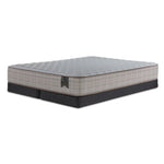 Origins by Serta Tradition King firm mattress on two charcoal low-profile split boxsprings