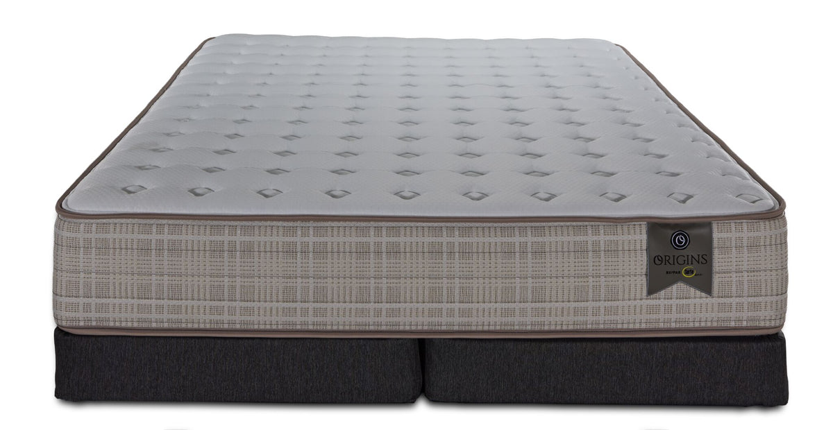 Front view of the King mattress and split foundations with white quilted top and beige patterned sides