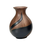 The Great Indoors Small Decorative Vase with rounded brown wood-look body and curved black accent design