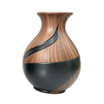 The Great Indoors Large Decorative Vase with brown wood-look finish and curved black accent design