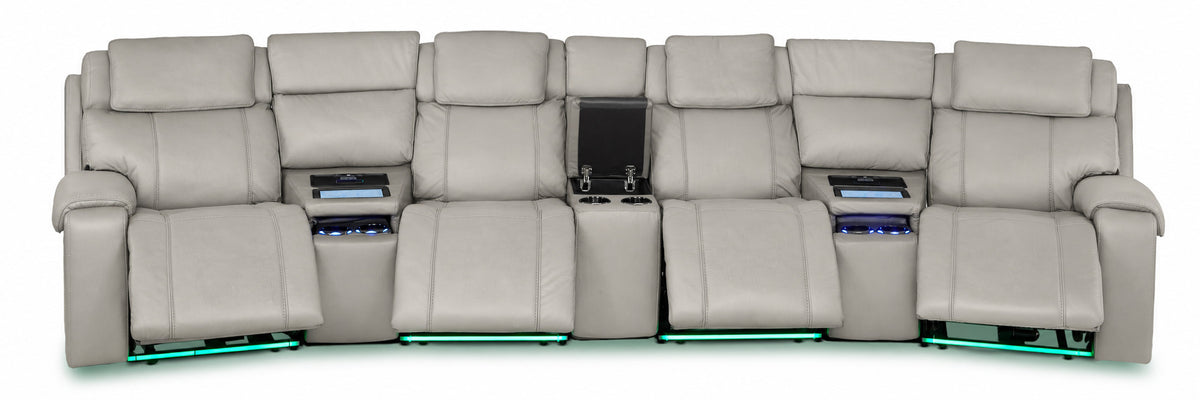 Velocity light grey home theatre seating front view with extended footrests, open console and illuminated base lighting