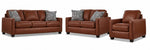 City Leather Sofa, Loveseat and Chair Set - Brown with matching leather seating, patterned accent pillows and dark wood legs