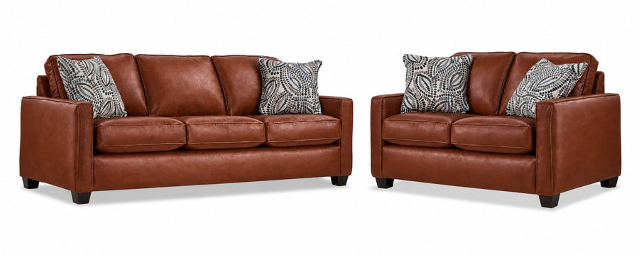 City Leather Sofa and Loveseat Set - Brown with matching leather seating, patterned accent pillows and dark wood legs