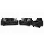 City Leather Sofa, Loveseat and Chair Set - Black with matching leather seating, patterned accent pillows and dark wood legs