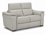 Matching two-seat grey leather loveseat with padded arms and raised headrests