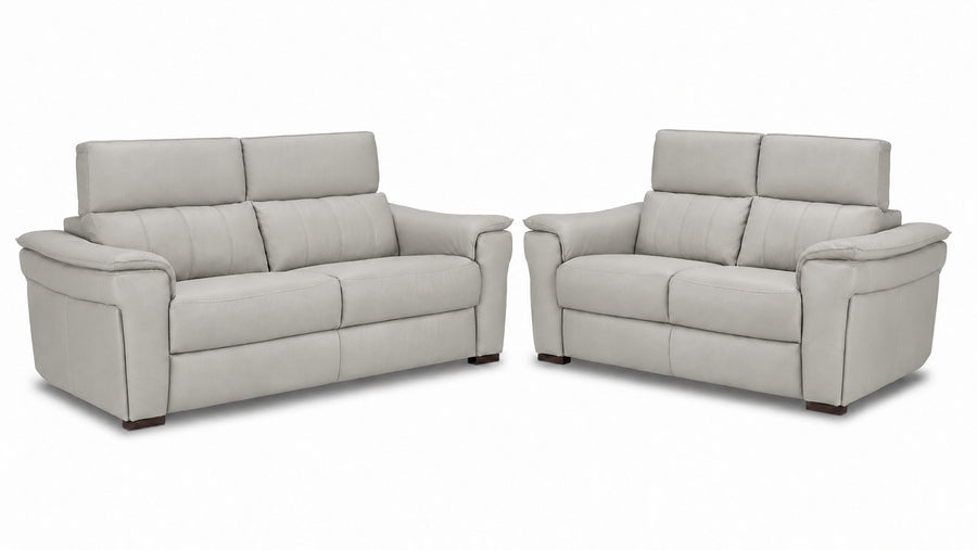Orlando-Ray grey leather sofa and loveseat set with padded arms and adjustable headrests