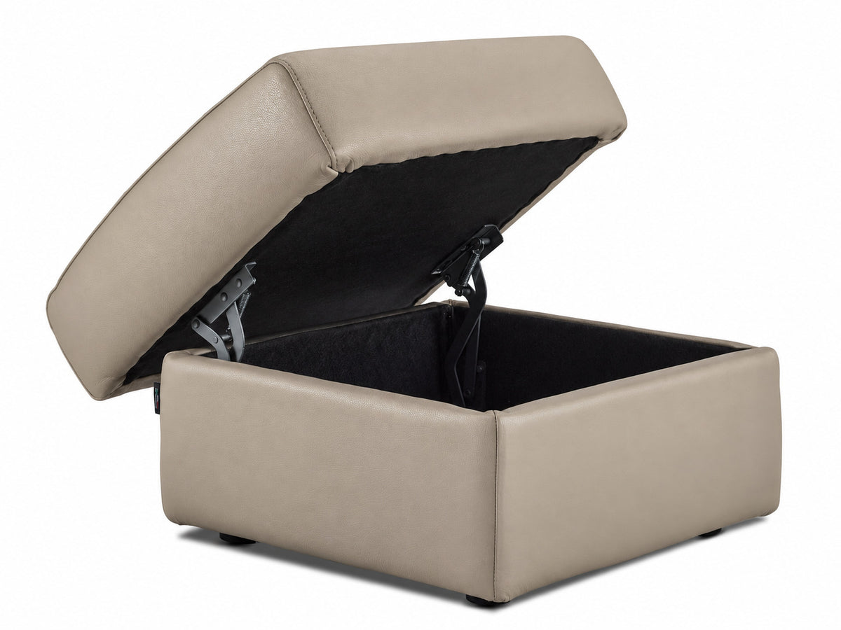 Tan leather ottoman with hinged top raised to reveal the black interior storage compartment