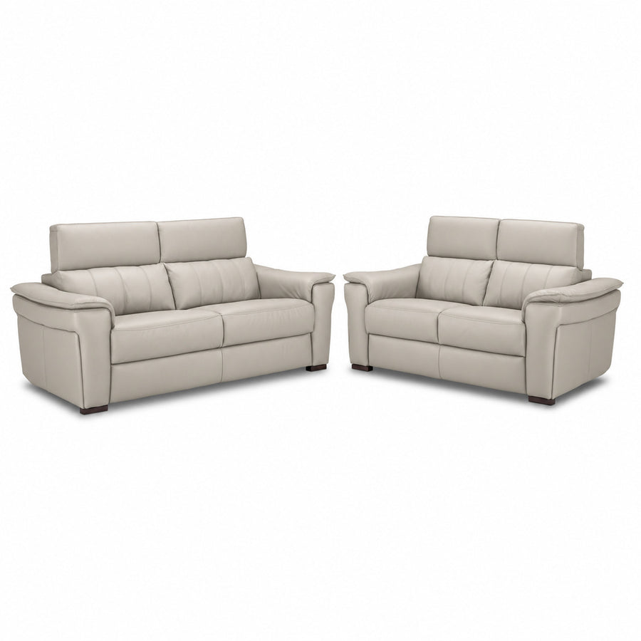Orlando-Ray light grey leather sofa and loveseat set with padded arms and adjustable headrests
