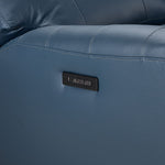 Apollo navy leather sofa close-up showing side-mounted power recline controls and USB charging ports