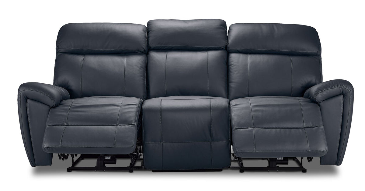 Apollo black leather reclining sofa front view with both end footrests extended and three padded headrests
