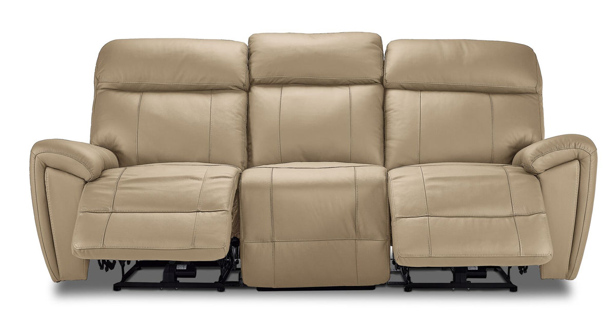 Apollo beige leather reclining sofa front view with both end footrests extended and three padded headrests