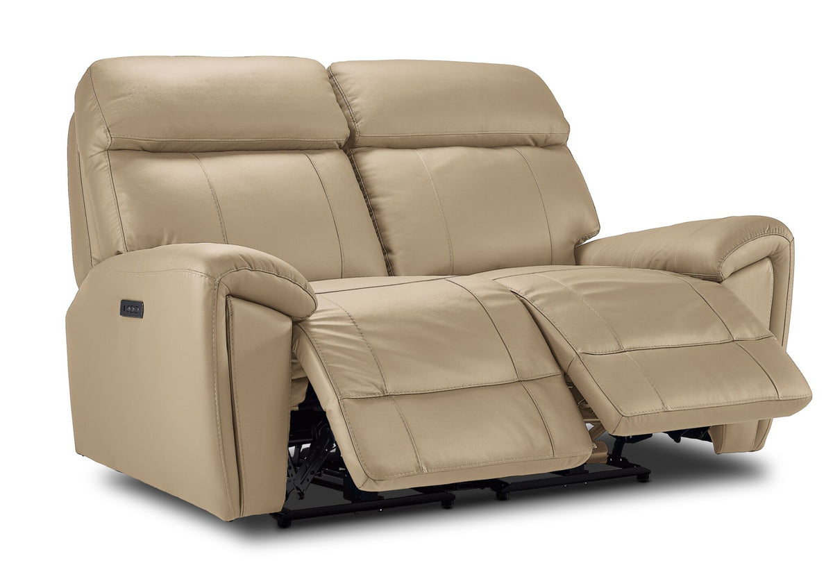 Apollo beige leather reclining loveseat angled view with both power footrests extended and padded headrests