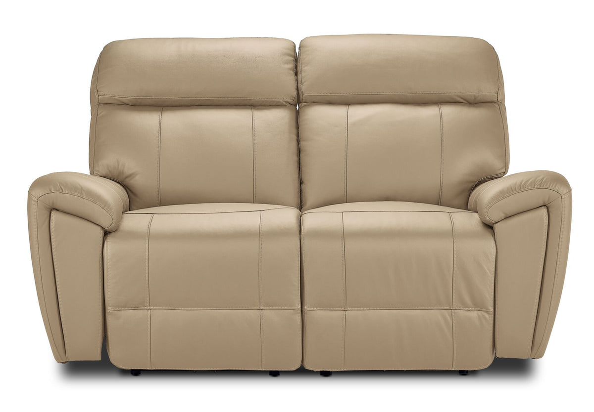 Apollo beige leather dual power reclining loveseat front view with two seats, plush headrests and padded arms