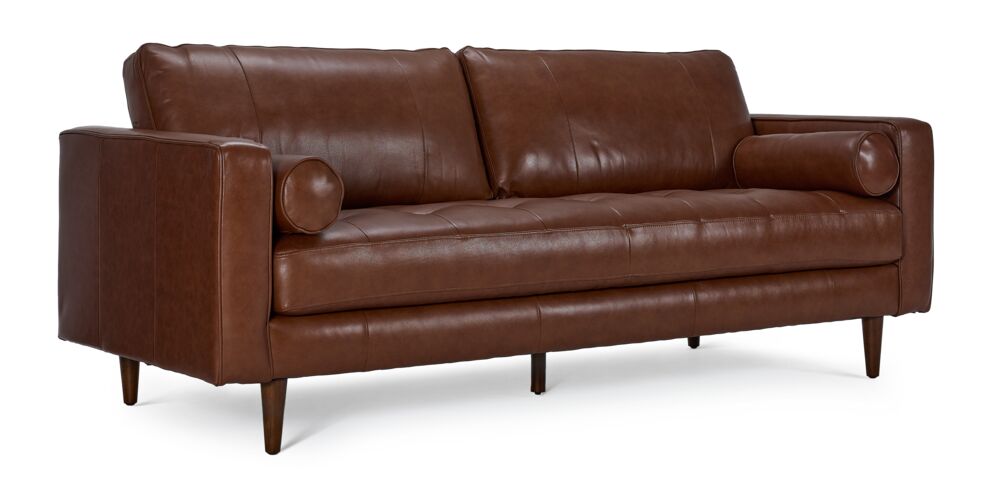 Bari Leather Sofa in cobblestone brown, shown at an angle with tufted seat, two bolster pillows, track arms and tapered wood legs