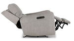 Side view of grey Chase Power Rocker Recliner fully reclined with raised footrest and adjustable headrest