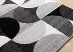Eclipse 5'3" x 7'7" Mid-Century Modern Design Area Rug - Grey, Black, White