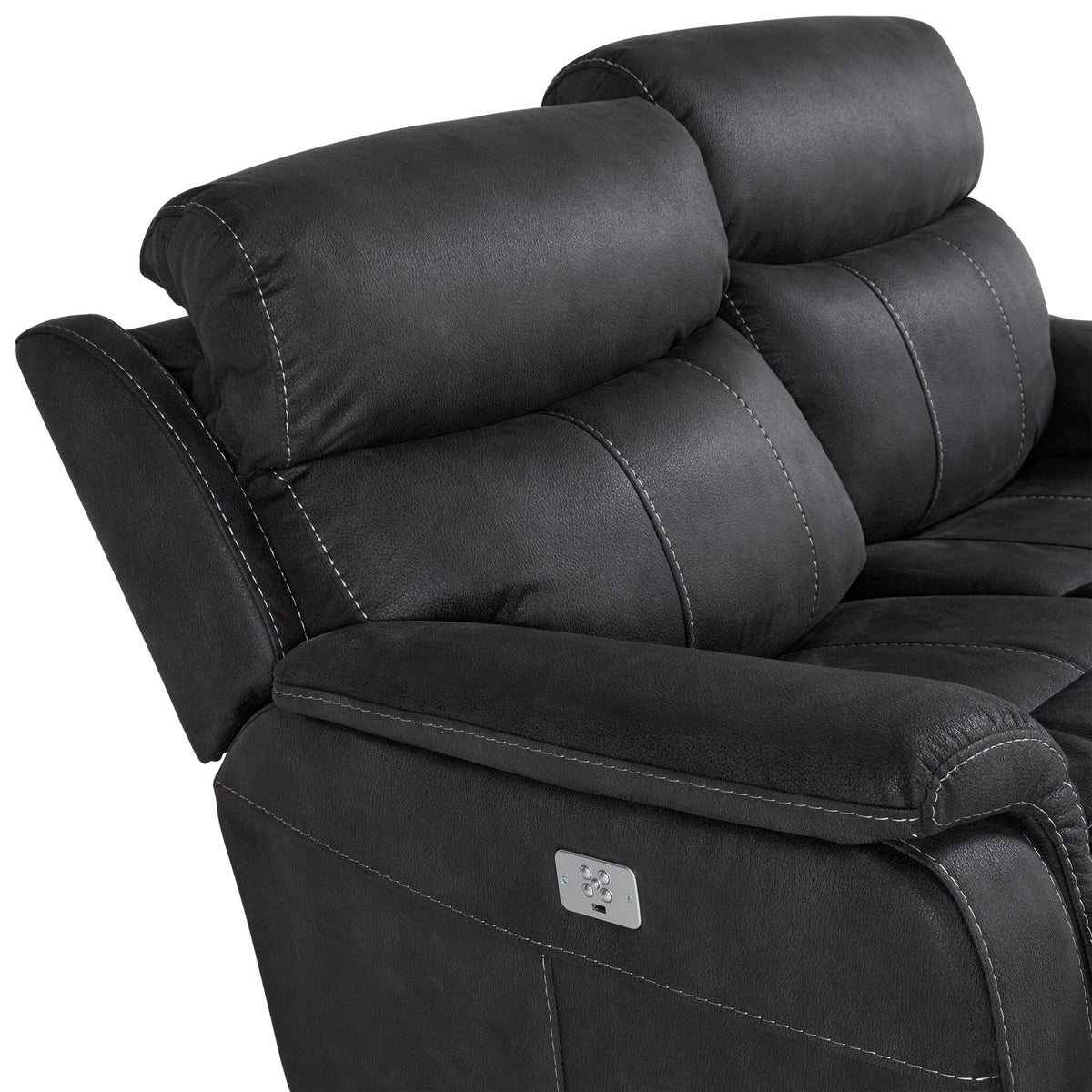Close-up of Haven grey loveseat showing padded power headrest, white contrast stitching and side-mounted power controls