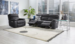 Haven grey reclining sofa and matching recliner with footrests extended in a living room