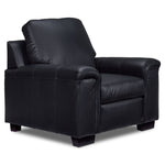Icon Leather Chair - Black, angled view with thick seat and back cushions, padded arms and dark wood feet