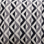 Jupiter Sectional accent pillow close-up showing a black, white and grey geometric fabric pattern