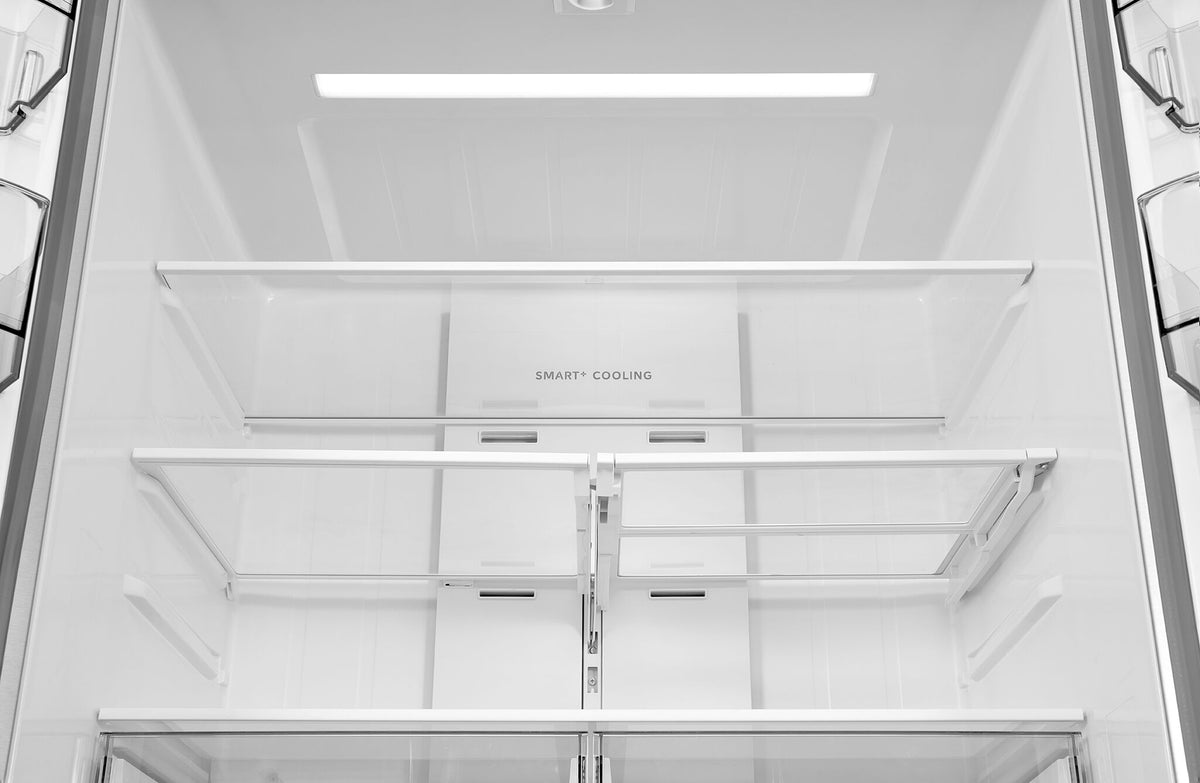 Adjustable glass shelves beneath LED lighting and Smart+ Cooling panel