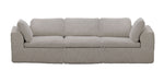 Front view of the Bliss beige modular compressed sofa with three seats, rounded arms and foam cushions