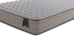 Detailed view of the white quilted top, textured side fabric and finished edge piping