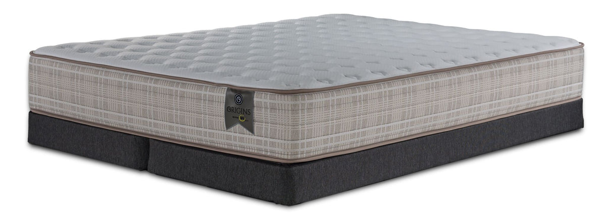 Origins by Serta Tradition King firm mattress on two charcoal low-profile split boxsprings