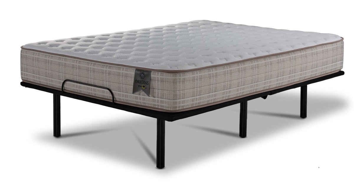 Twin XL firm mattress on the black L2 Motion 2.0 adjustable base in a flat position