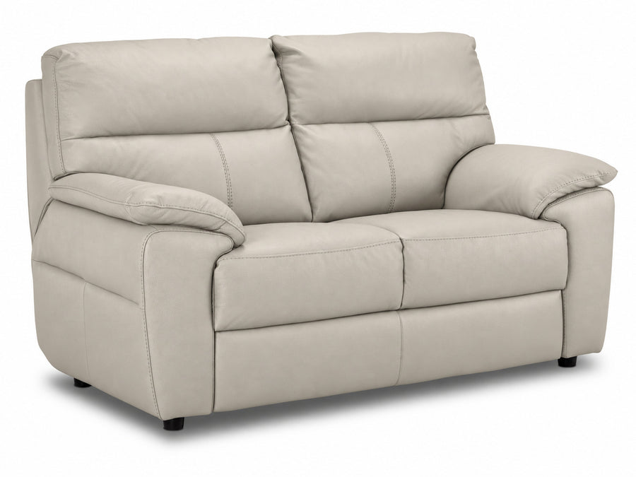 Toscana cream leather loveseat with two deep seats, plush back cushions and padded arms