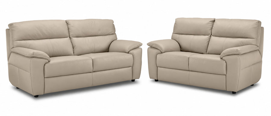 Toscana tan leather sofa and loveseat set with deep seating and pillow-top arms