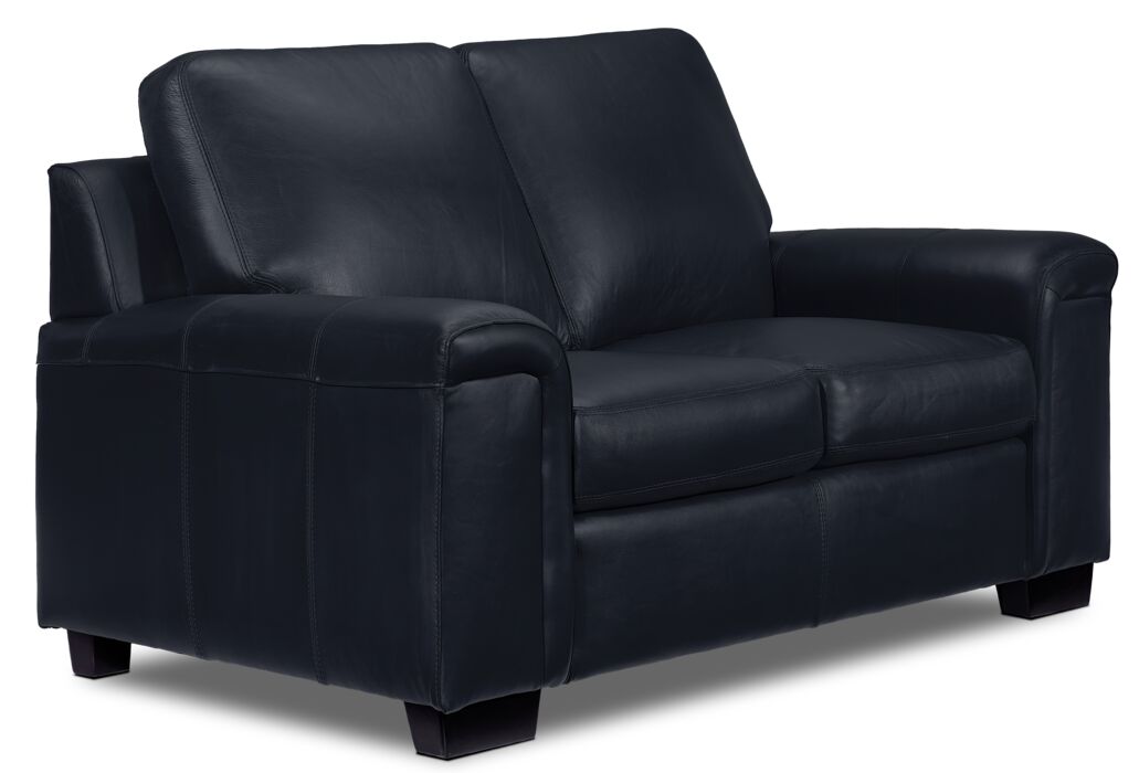 Icon Leather Loveseat - Navy angled view with two cushioned seats, padded arms and dark wood feet